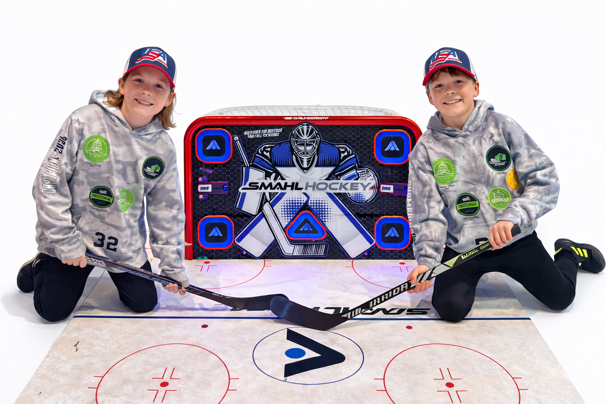 Kids playing SMAHL Hockey on the Game Zone Mat